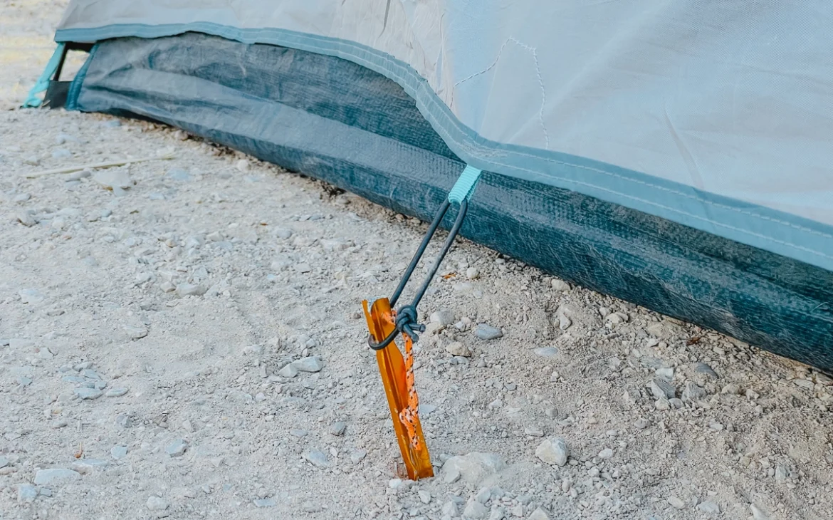 We recommend getting some additional tent pegs. This is one of the styles we use for softer ground.